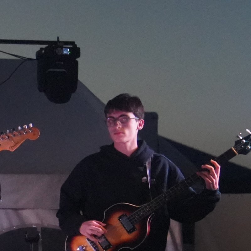 Merijn C. playing bass guitar