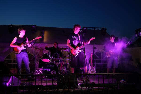 Full band performing with purple haze