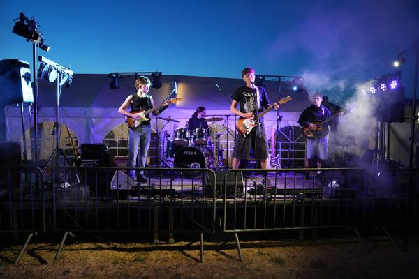 Wide stage shot with purple smoke