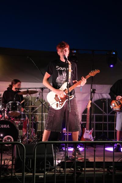 Singer and guitarist performing live